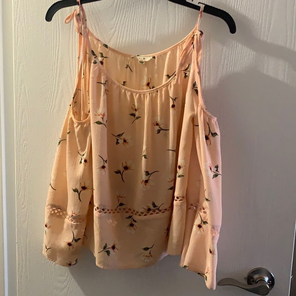 Peach colored open shoulder blouse